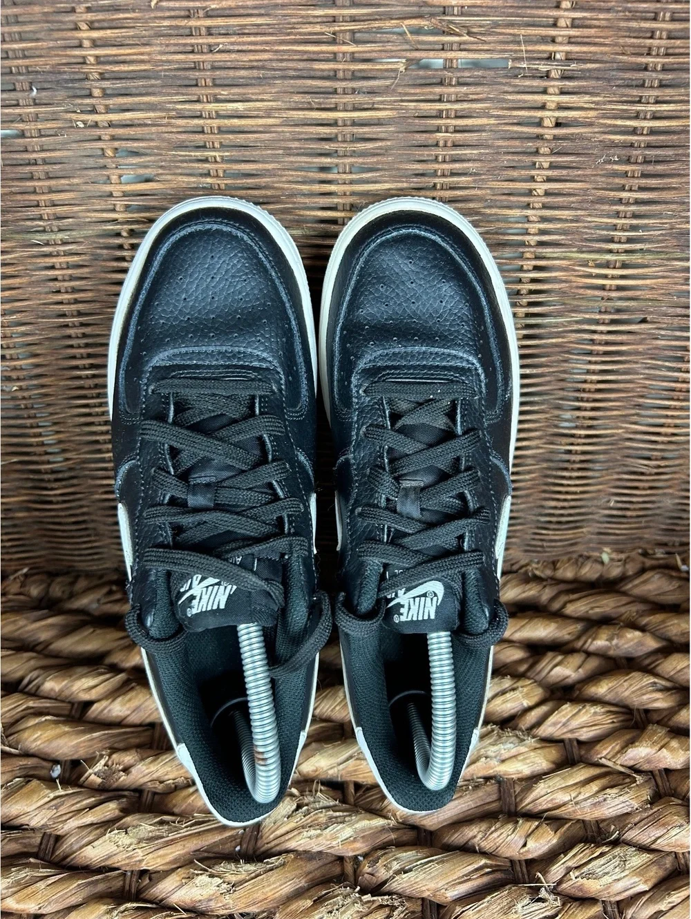 Nike Air Force 1 black and white low sneakers